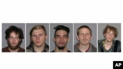 This combination of handout booking photos provided May 1, 2012 by the FBI shows L-R: Connor Stevens, Brandon Baxter, Douglas Wright, Anthony Hayne and Joshua Stafford.