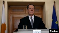 Presiden Siprus Nicos Anastasiades menyampaikan pidato kenegaraan dari Istana Presiden di Nicosia (25/3).