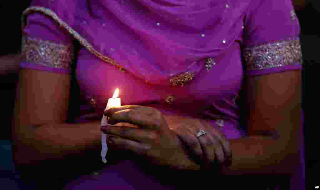 A candle light vigil was held in Milwaukee, Wisconsin for the victims, August 5, 2012.