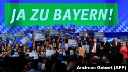 Münih'te Eylül başındaki Hristiyan Sosyal Birlik (CSU) Partisi toplantısında bir araya gelen parti başkanı Horst Seehofer and Bavyera eyaleti başbakanı Markus Soeder 