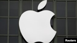 FILE - The Apple Inc. logo is shown outside the company's Worldwide Developers Conference in San Francisco, California, June 13, 2016. 