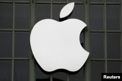 FILE - The Apple logo is shown outside the company's Worldwide Developers Conference in San Francisco, California, June 13, 2016.