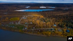 The Yukon River stretches past Stevens Village, Sept. 15, 2021, near Stevens Village, Alaska.