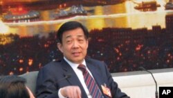中共重庆市委书记薄熙来(资料照片，2010年3月6日摄于北京人民大会堂)