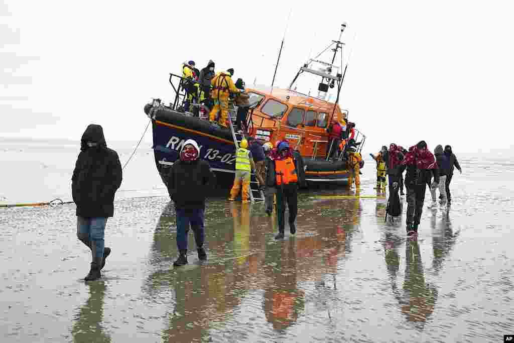 A group of people thought to be migrants are brought in to Dungeness, Kent, England, following a small boat incident in the Channel. 