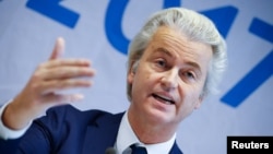 FILE - Netherlands Freedom Party leader Geert Wilders attends a news conference in Koblenz, Germany, Jan. 21, 2017. Wilders said Aug. 30, 2018, that he was calling off a planned cartoon contest in which entrants would depict the Prophet Muhammad.
