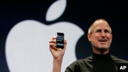 Steve Jobs announces the first iPhone at an Apple event in early 2007.