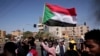People chant slogans during a demonstration against the killing of dozens by Sudanese security forces since the Oct. 25, 2021 military takeover, in Khartoum, Sudan, Jan. 20, 2022.