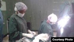 FILE: Ethiopian based Fistula surgeon Dr. Ambaye Wolde Michael of the Women and Health Alliance performs surgery on 14 Zimbabwean women suffering from the injury. 