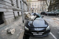 A damaged car is seen following an earthquake, in Zagreb, Croatia March 22, 2020. REUTERS/Antonio Bronic