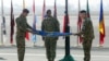 مراسم پیچاندن بیرق ناتو حین اعلام ختم ماموریت محاربوی در افغانستان