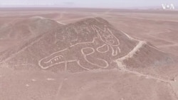 Drone Footage Reveals Ancient Cat Etched into Peru Hillside 