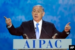 FILE - Israeli Prime Minister Benjamin Netanyahu gestures while speaking at the 2015 American Israel Public Affairs Committee (AIPAC) Policy Conference in Washington, D.C., March 2, 2015.