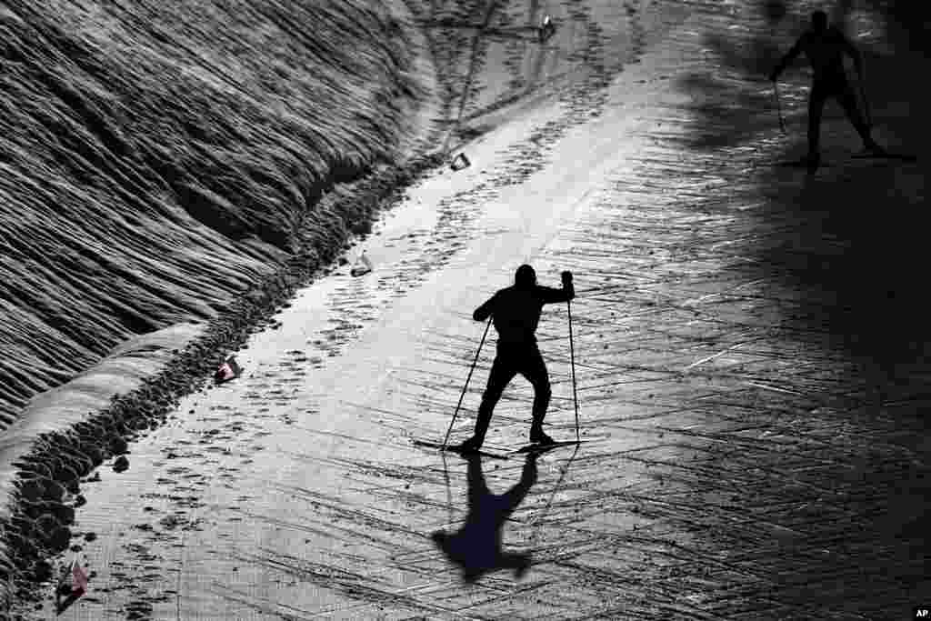 An athlete warms up prior to the men's Individual Gundersen NH 15km cross country competition at the Nordic Combined World Cup in the Austrian province of Tyrol, in Seefeld, Austria.