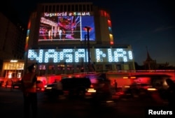 FILE - The NagaWorld casino is seen in central Phnom Penh, Cambodia, Jan. 11, 2014.