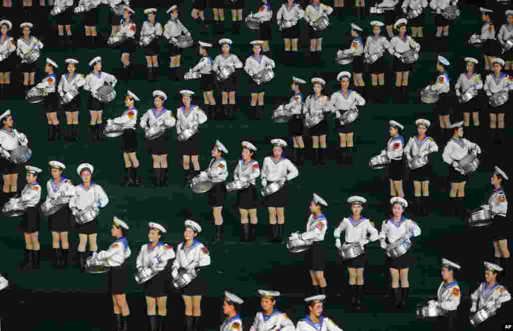 Performers participate in the Arirang mass games in Pyongyang, North Korea. This year&rsquo;s performance was timed to debut for the 60th anniversary of the end of the Korean War, and features new scenes focusing on leader Kim Jong Un&rsquo;s directives. 