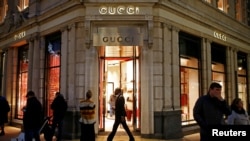 FILE - The Gucci store in central London, Dec. 16, 2018. Gucci says it will be working to build up its cultural awareness in light of the uproar to a sweater that resembled blackface.