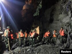 Chinese paramilitary police search for survivors after an earthquake in Jiuzhaigou county, Ngawa prefecture, Sichuan province, China August 9, 2017.