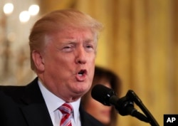 FILE - President Donald Trump in the East Room of the White House, Tuesday, Feb. 13, 2018, in Washington.