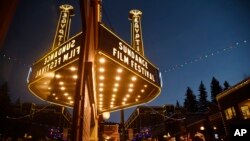 FILE - The marquee at the Egyptian Theatre appears on the eve of the 2017 Sundance Film Festival in Park City, Utah, Jan. 18, 2017. 