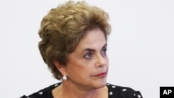 Brazil's President Dilma Rousseff listems in during a meeting at the Planalto Presidential Palace, in Brasilia, April 13, 2016.