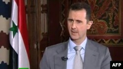 Syrian President Bashar al-Assad during interview with Russian Today, Damascus, Nov. 8, 2012.