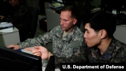 FILE - US and South Korean military officers conducts air and missile defense operations at Osan Air Base, South Korea, during a joint excercise, March 14, 2016.