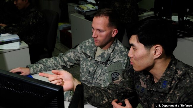 FILE - US and South Korean military officers conducts air and missile defense operations at Osan Air Base, South Korea, during a joint excercise, March 14, 2016.