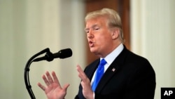 President Donald Trump speaks during a news conference in the East Room at the White House in Washington, Nov. 7, 2018. 