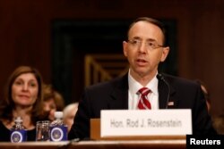 FILE - Rod Rosenstein, nominee to be Deputy Attorney General, testifies before the Senate Judiciary Committee on Capitol Hill in Washington, March 7, 2017.