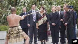 U.S. Secretary of State Hillary Rodham Clinton looks on during a traditional Maori welcoming ceremony after arriving at the Parliament Complex, Wellington, New Zealand, 04 Nov. 2010.