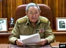 FILE - A screenshot from Cuban television shows President Raul Castro addressing the country, in Havana, Dec. 17, 2014.