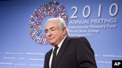 International Monetary Fund (IMF) Managing Director Dominique Strauss-Kahn arrives for the opening news conference of the annual IMF and World Bank meetings, Thursday, Oct. 7, 2010, in Washington