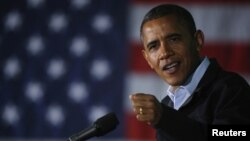 U.S. President Barack Obama speaks during a campaign rally in Hilliard, Ohio, November 2, 2012. 