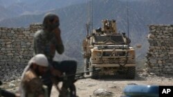 U.S. forces and Afghan security police are seen in Asad Khil in the Achin district of Jalalabad, east of Kabul, Afghanistan, April 17, 2017. 