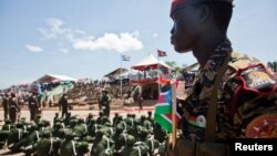 A Sudan People's Liberation Army (SPLA) soldier watches on during a parade celebrating their 29th anniversary in South Sudan's capital Juba, May 16, 2012. 