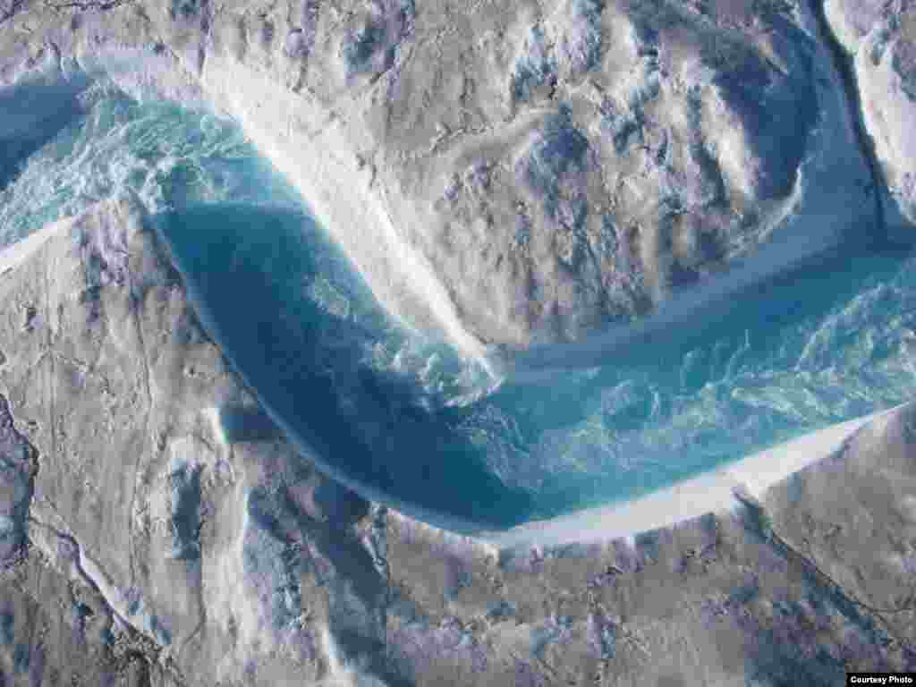The rivers and streams that carry glacial meltwater across Greenland&rsquo;s ice sheet are a beautiful shade of blue, but the water moves so fast and drains so unpredictably into moulins or sinkholes that researchers needed to use a range of high-tech instruments to get their measurements. (UCLA/Laurence C. Smith)