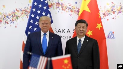 Tổng thống Mỹ Donald Trump và Chủ tịch Trung Quốc Tập Cận Bình tại cuộc gặp bên lề thượng đỉnh G20 ở Osaka, Nhật Bản, hôm 29/6/19.