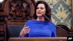 Michigan Gov. Gretchen Whitmer delivers her State of the State address to a joint session of the House and Senate, Feb. 12, 2019, at the state Capitol in Lansing, Michigan.