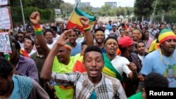 Ethiopians chant slogans during a rally in support of the new Prime Minister Abiy Ahmed in Addis Ababa, Ethiopia, June 23, 2018.