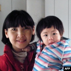 台北县居民刘女士和女儿