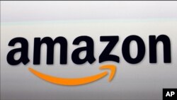 The Amazon logo. Digital civil rights groups are trying to persuade Google and Amazon to allow encrypted messaging apps to continue to use a digital disguise.