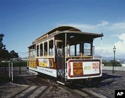 Near the famous Fisherman's Wharf, a cable car reverses direction for a return trip downtown atop a turntable similar to those found in old railroad roundhouses.