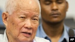 Khieu Samphan, former Khmer Rouge head of state, looks on before his final statements at the U.N.-backed war crimes tribunal in Phnom Penh, Cambodia, Thursday, Oct. 31, 2013. 