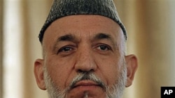 Afghan President Hamid Karzai during a press conference in Kabul, during which he said that once or twice a year Iran gives his office $700,000 to $975,000 for official presidential expenses, 25 Oct 2010