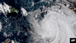 18일 미 항공우주국 정지기상관측위성으로 촬영한
허리케인 '마리아'. 허리케인의 눈이 도미니카공화국에 매우 접근했다.