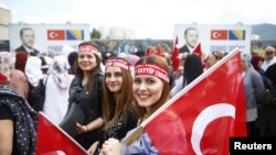 FILE - Supporters of Turkish President Recep Tayyip Erdogan gather before a pre-election rally in Sarajevo, Bosnia and Herzegovina, May 20, 2018. 