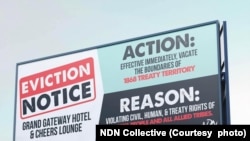 The indigenous rights group NDN Collective erected this billboard in Rapid City, S.D. to protest hotel's discrimination.