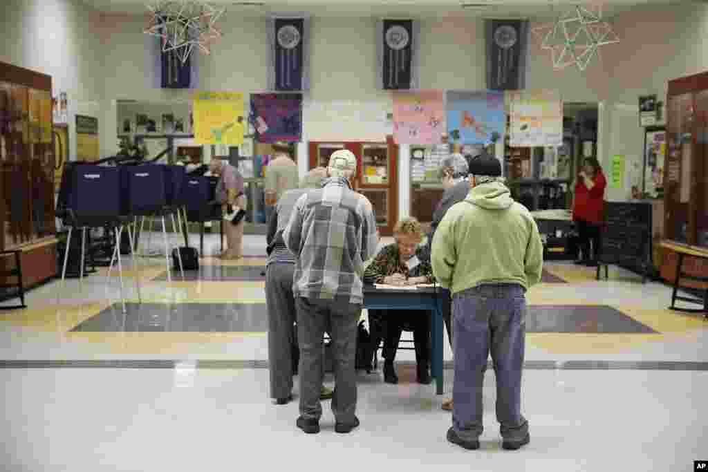 South Carolina voters arrive to vote in the Republican presidential primary at Pine Ridge Middle School in West Columbia, S.C., Feb. 20, 2016.