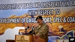 FILE - Former Pakistan Army Chief General Raheel Sharif addresses the China-Pakistan Economic Corridor (CPEC) seminar in Gwadar, Pakistan. From Pakistan to Tanzania to Hungary, "Belt and Road Initiative" projects are being canceled, renegotiated or delayed because of disputes about costs or complaints host countries get too little out of projects built by Chinese companies and financed by loans from Beijing.